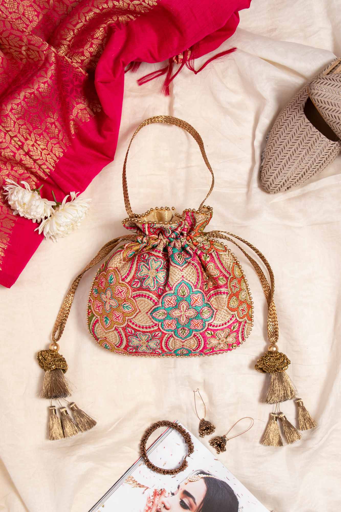 AMYRA Amna Embroidered Potli bag - Cream