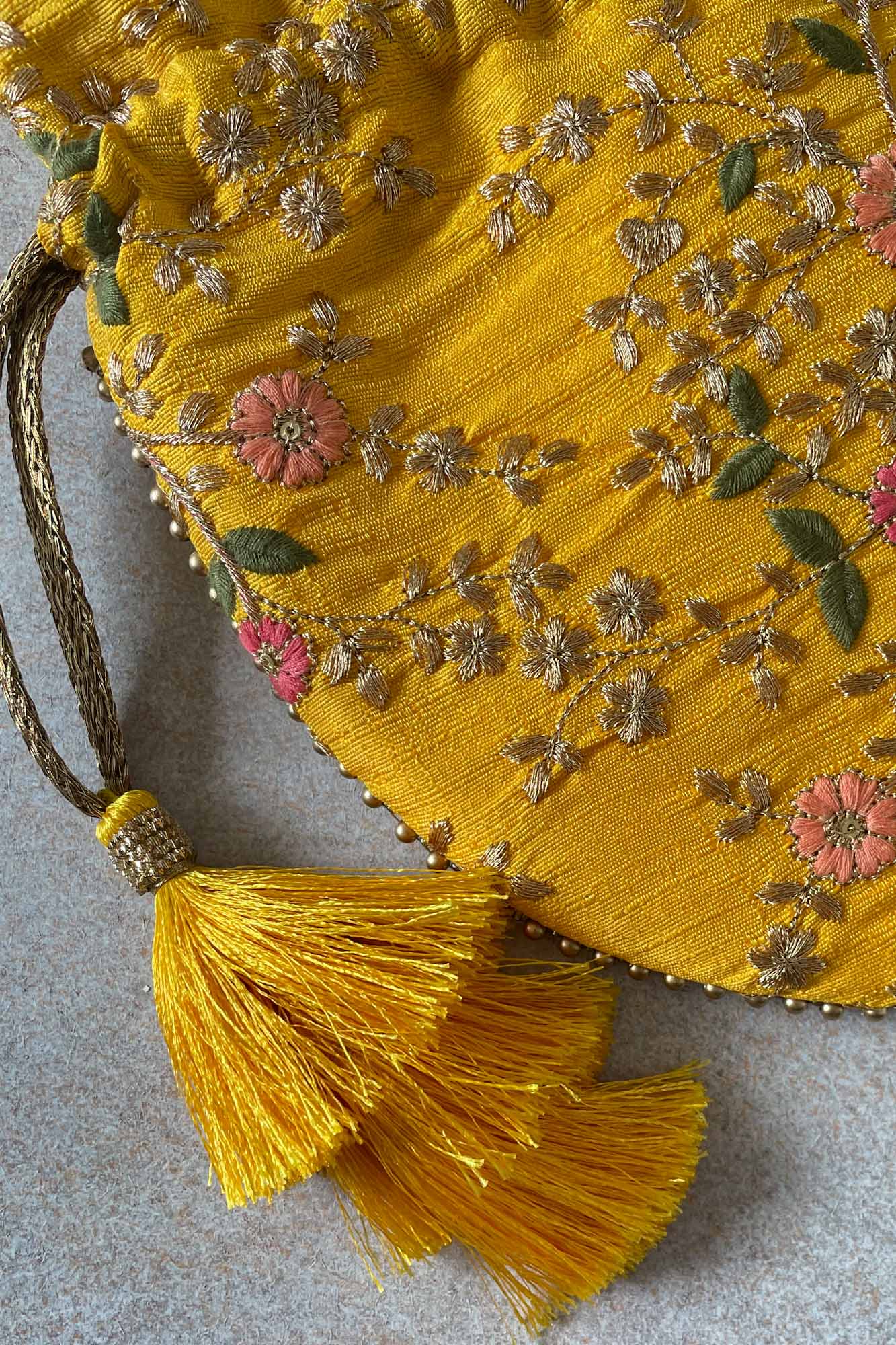 AMYRA Floral creeper potli bag yellow