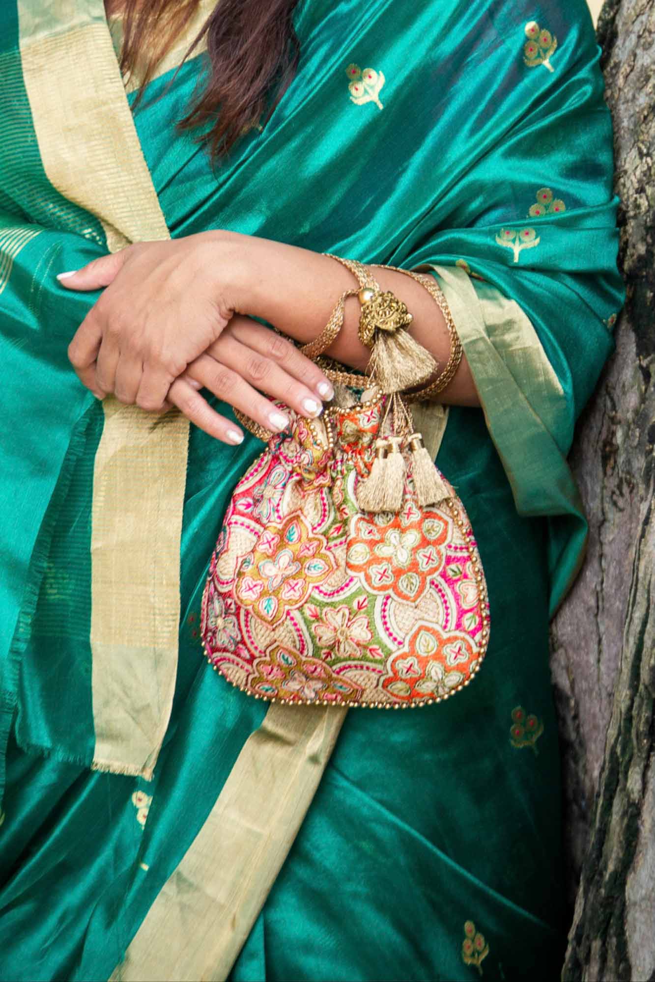 AMYRA Amna Embroidered Potli bag - Cream