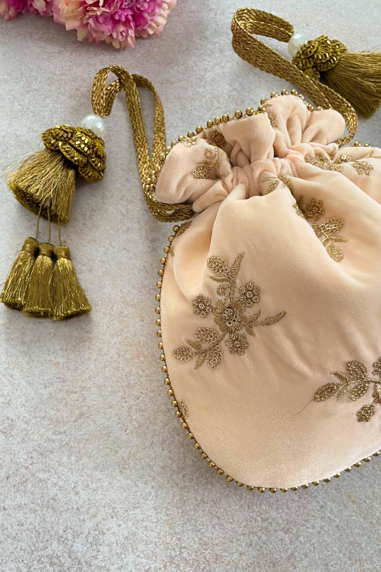 AMYRA Peach Velvet Embroidered Potli bag