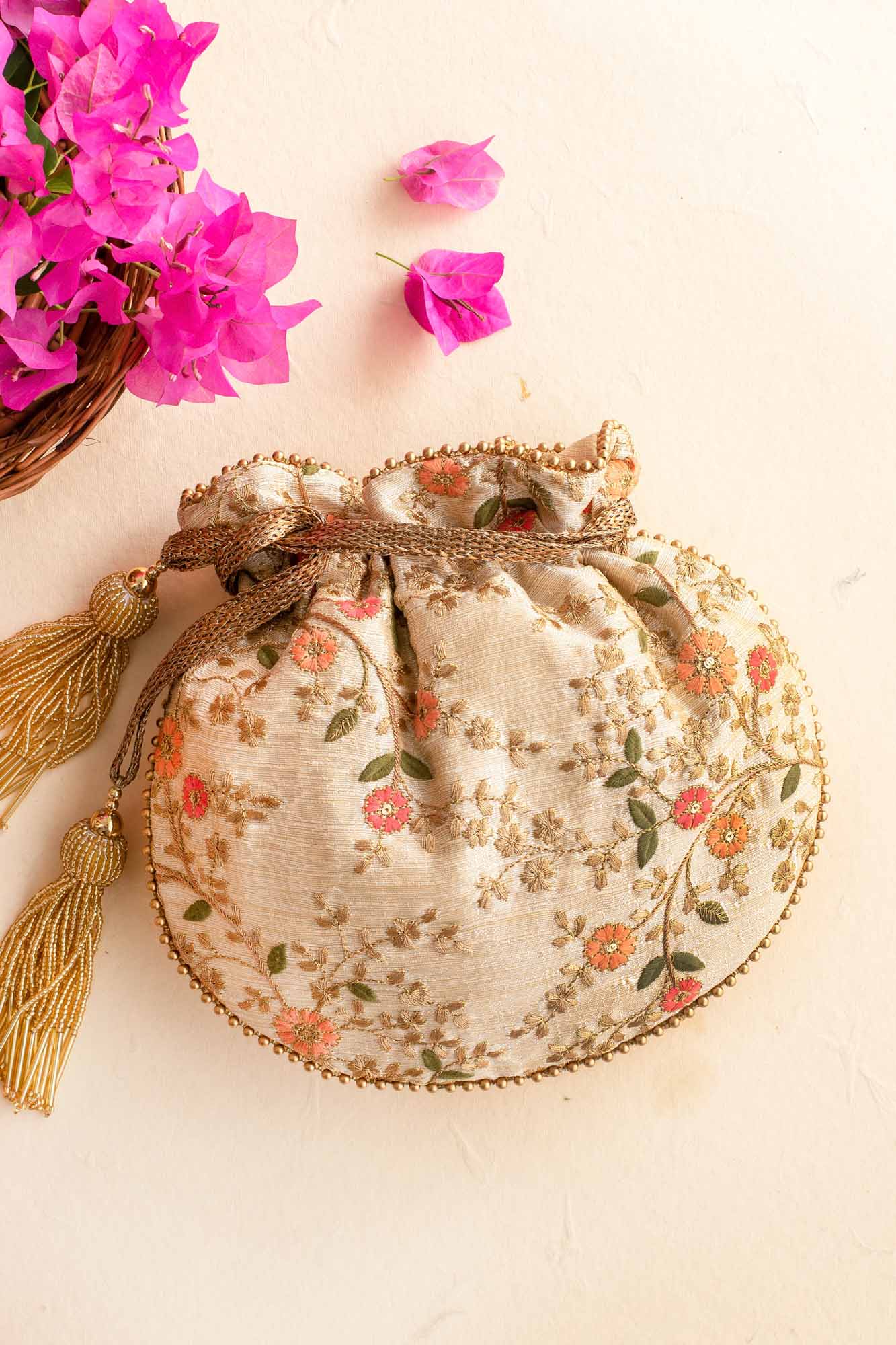 AMYRA Floral Creeper Cream Potli bag