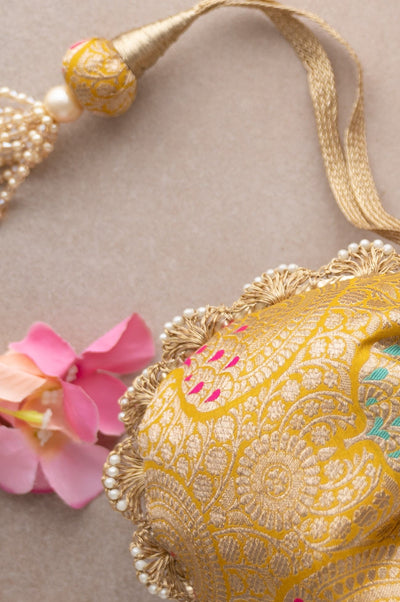 Amyra kashi mustard pure banarasi silk potli