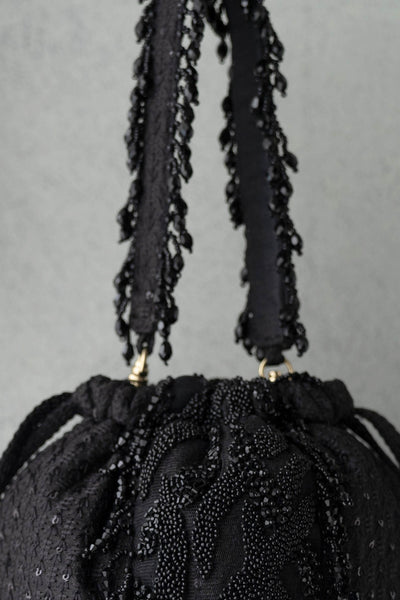 Amyra Kohl bucket bag
