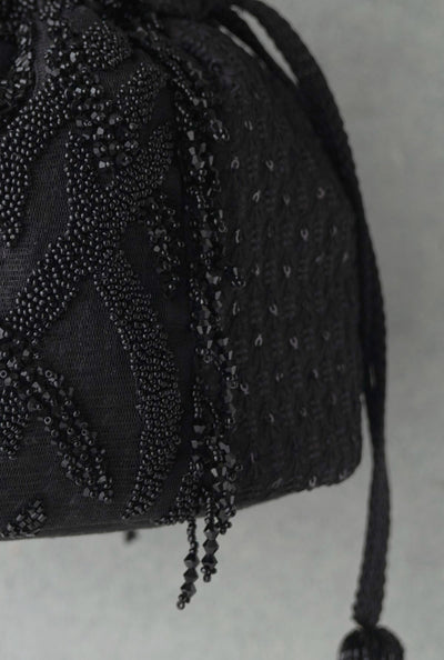 Amyra Kohl bucket bag