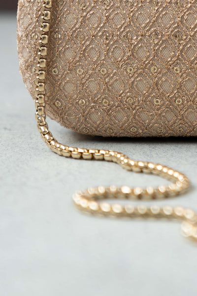 AMYRA Oro gold sequin clutch