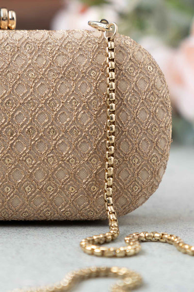 AMYRA Oro gold sequin clutch