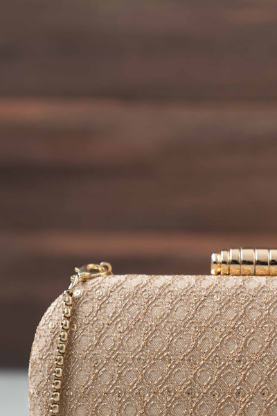 AMYRA Oro gold sequin clutch