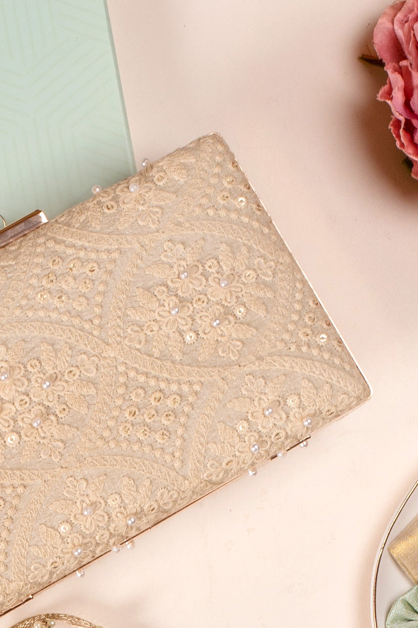 AMYRA oyster beige pearl clutch