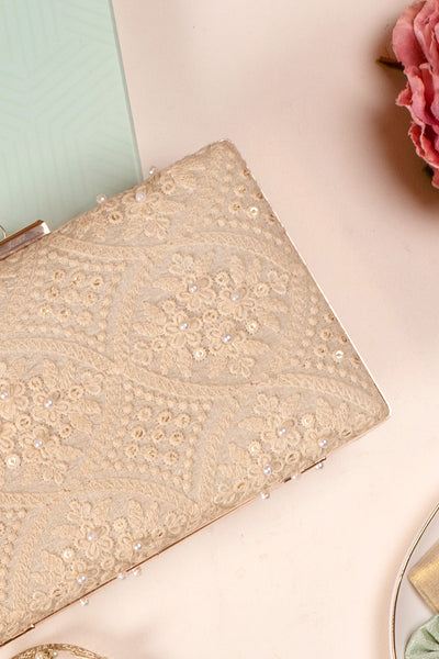 AMYRA oyster beige pearl clutch